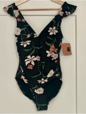 NWT.  XS elegant swimsuit with  rash guard